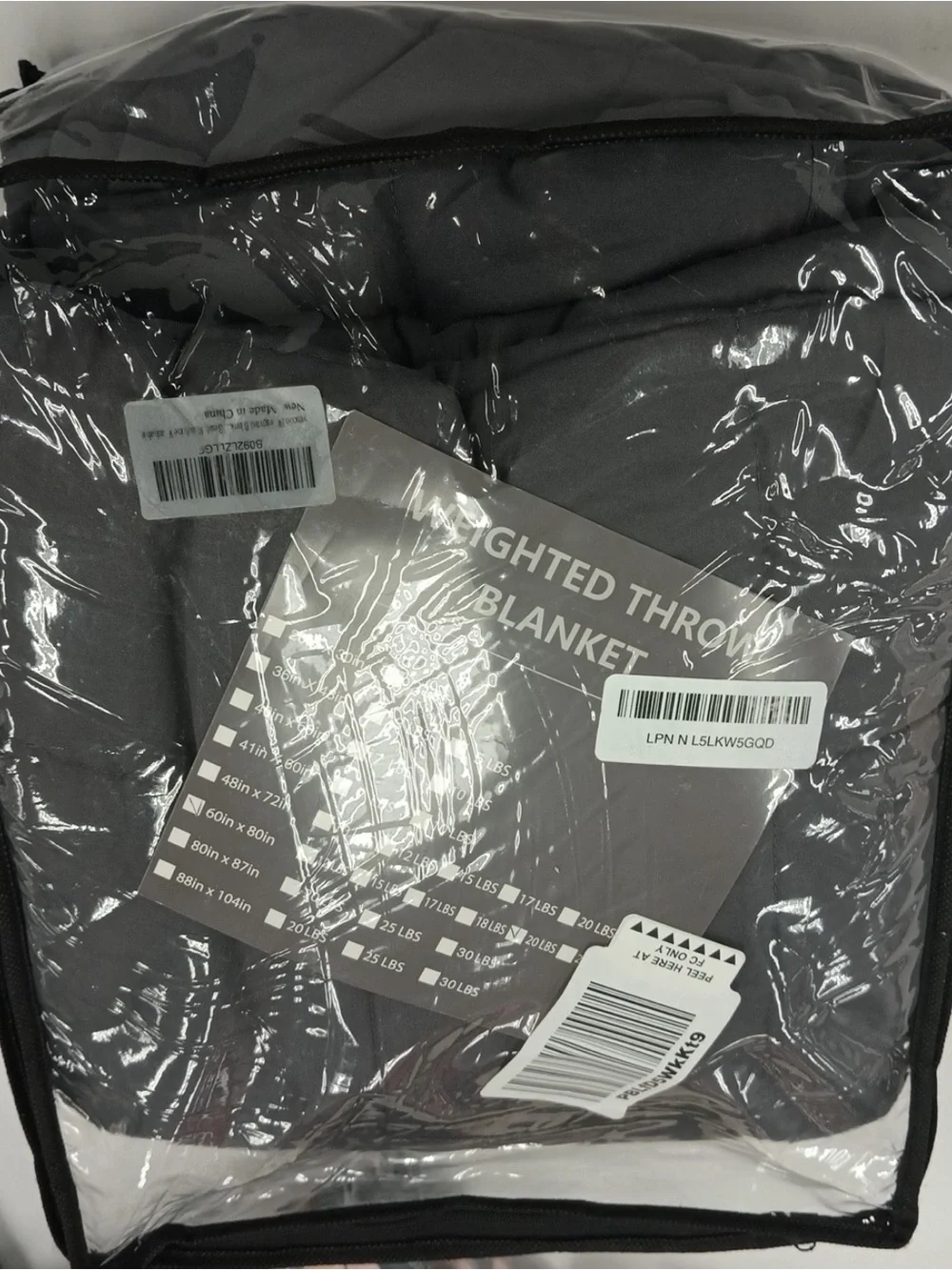 Weighted throw blanket